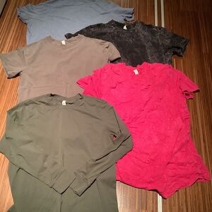 Bundle of lululemon shirts.